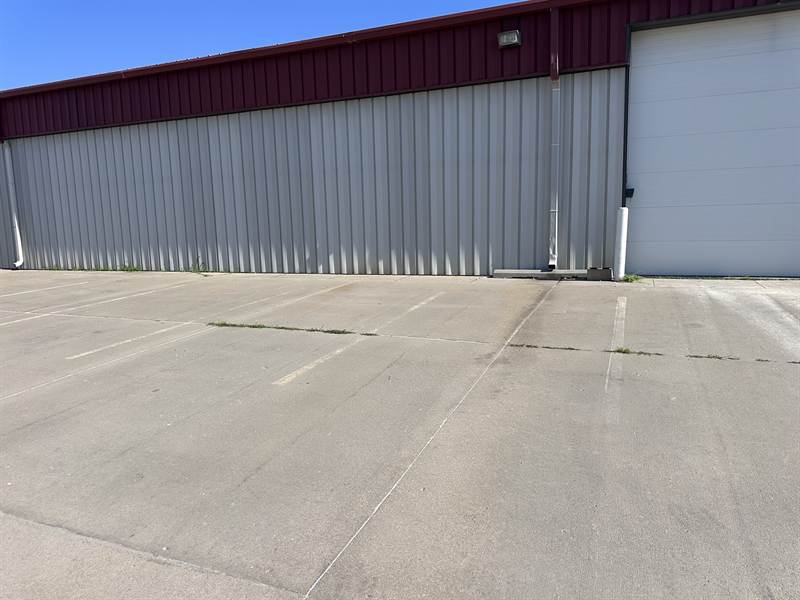 Faded parking lot lines before re-striping