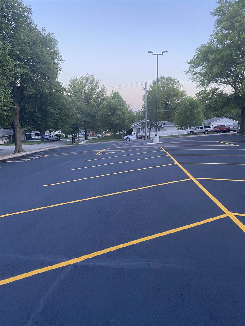 Freshly painted lines on a resealed parking lot