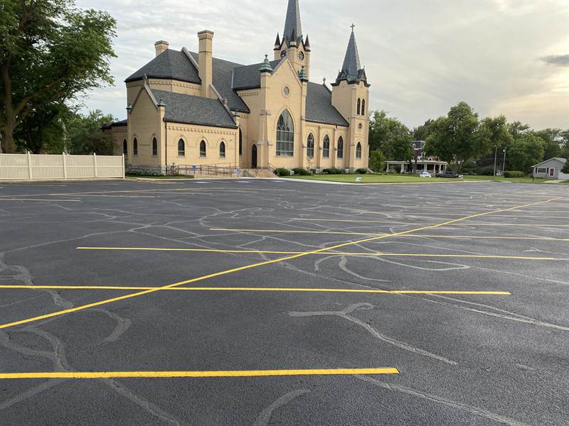 New parking stall layout striped on a large church parking lot