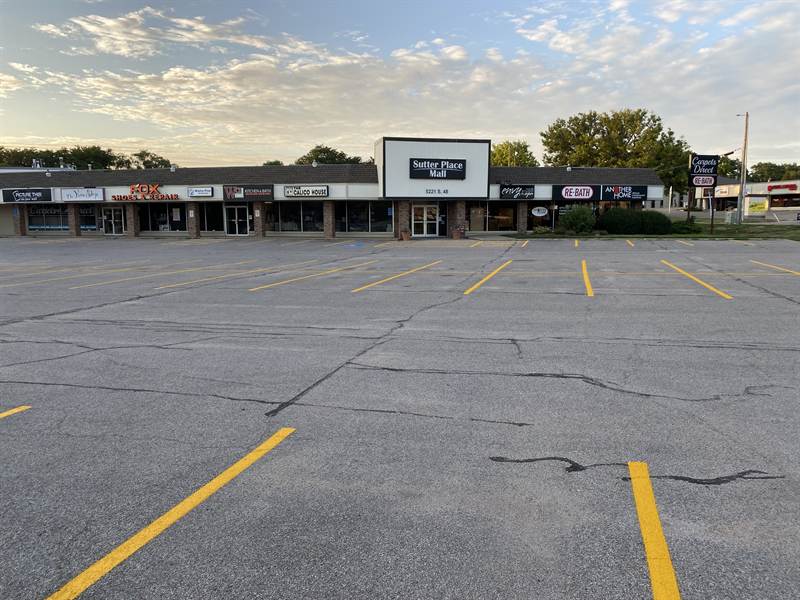 Large shopping center parking lot fully re-striped