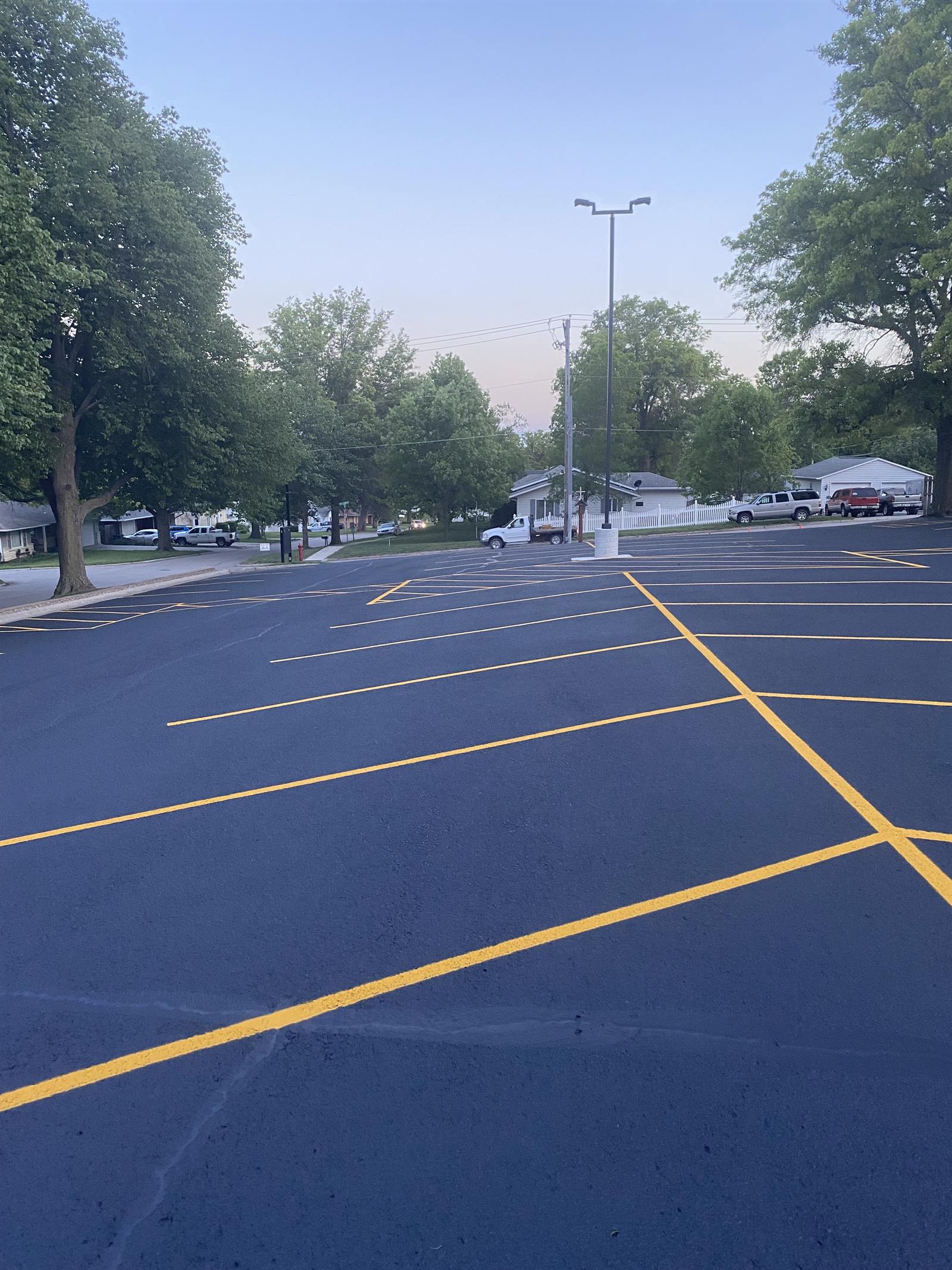 Freshly re-striped lines on a resealed parking lot