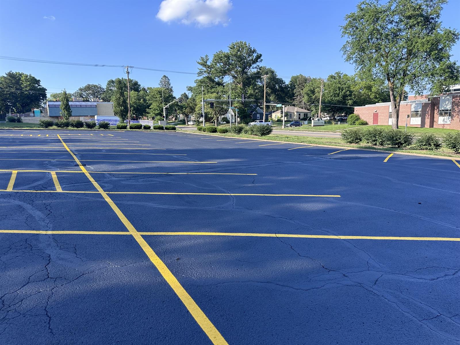 Freshly painted asphalt parking lot with crisp, high-contrast lines